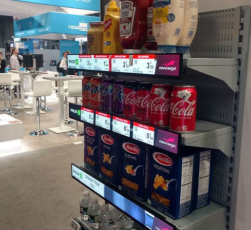 eShelf digital shelf-edge displays showing live pricing under supermarket products